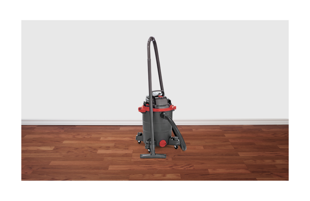 Shop-Vac WARN case settlement. View of a Shop-Vac barrel style heavy duty vacuum in an empty room.