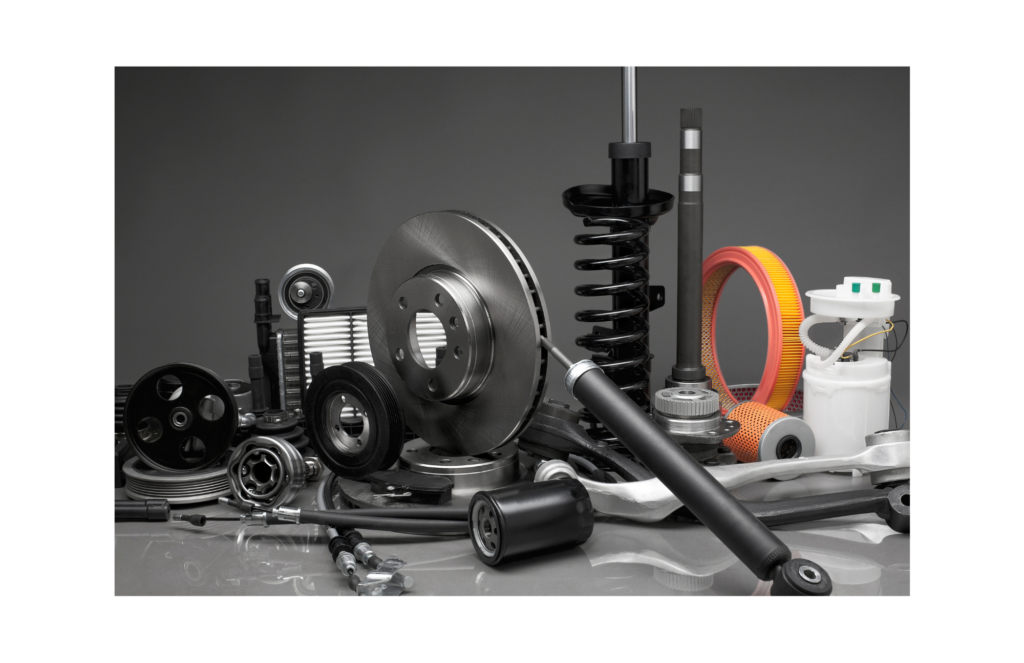 Close up view of different auto parts: air filters, shocks, etc.