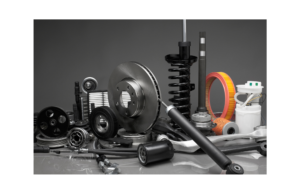 Close up view of different auto parts: air filters, shocks, etc.