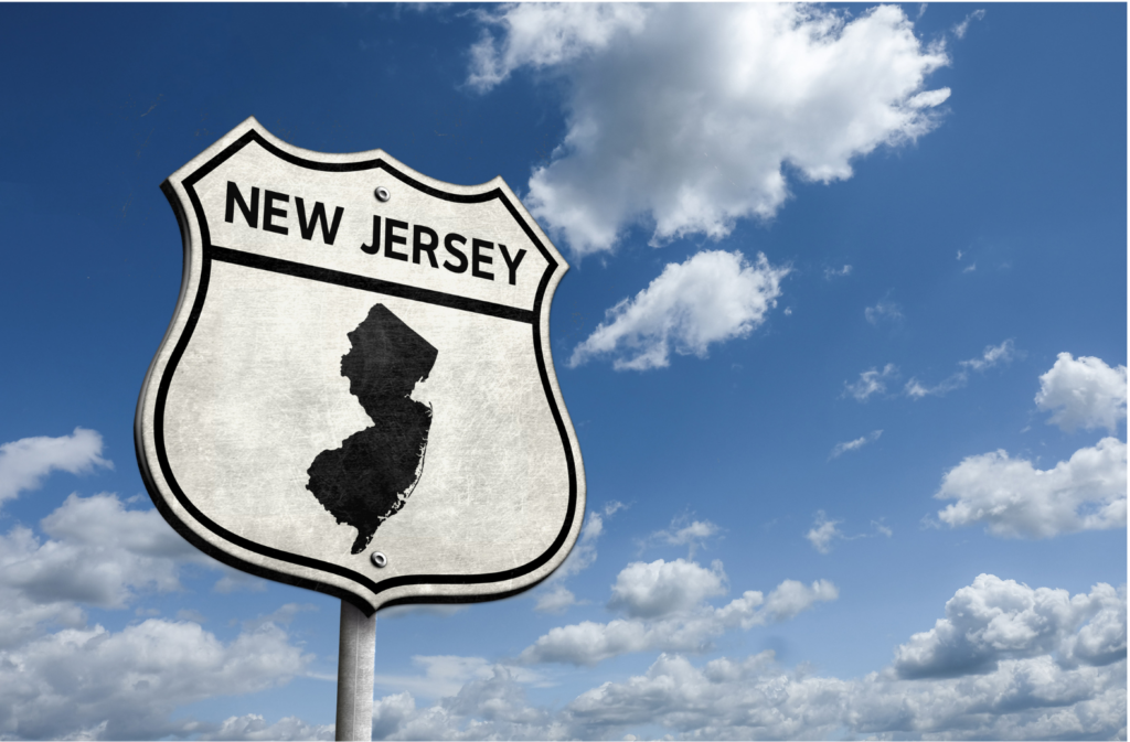 The New Jersey WARN Act. View of street sign reading NEW JERSEY at the top with a silhouette of the map of the state below.