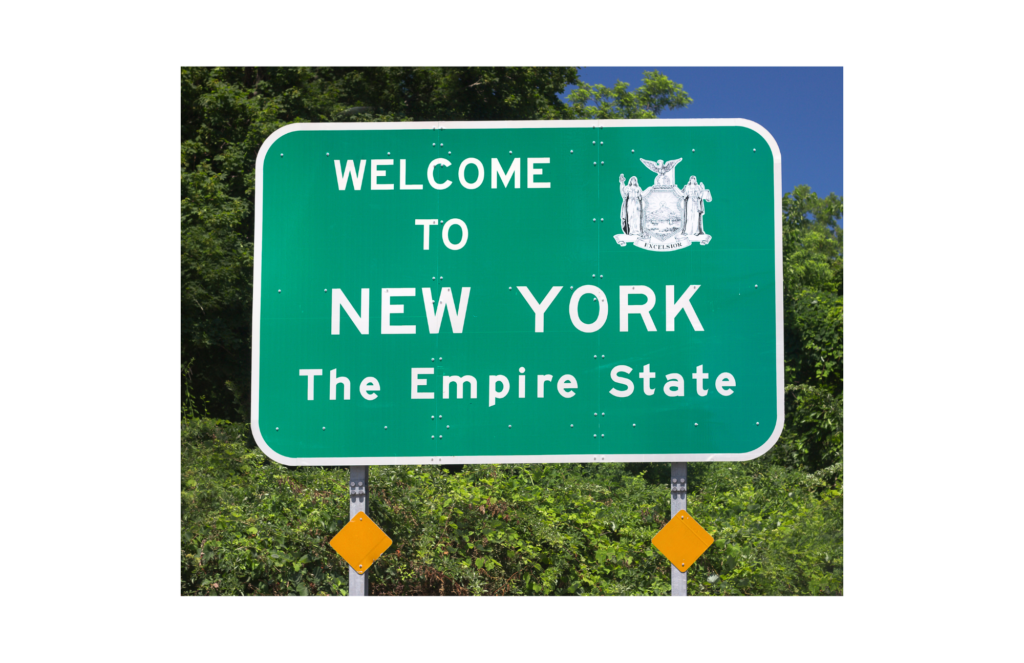 New York WARN Act, view of street sign, the sign reads: Welcome to New York, The Empire State, and shows the state crest which includes the word Excelsior at the bottom.