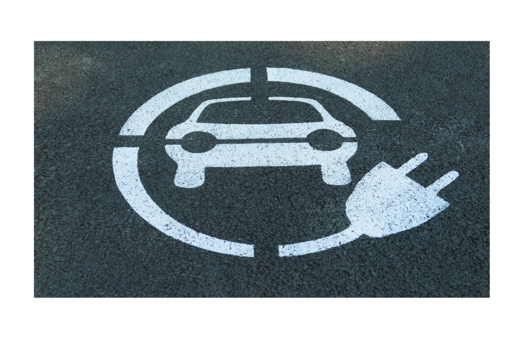 Fisker WARN class action. Parking space stencil of a car with an extension cord wrapped around it, indicating electric vehicle charging.