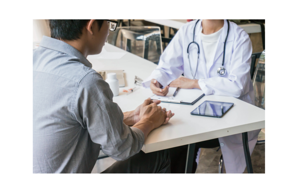 Optum WARN case. View of a medical professional interviewing a patient, with a tablet, clipboard, and pen present.