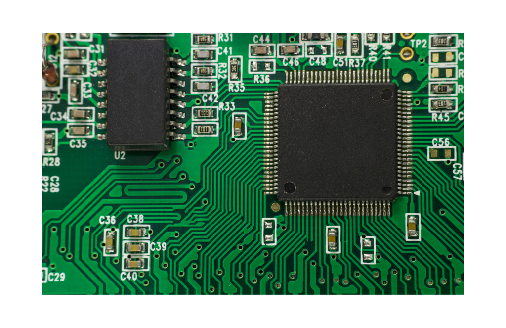 Qimonda WARN class action. Close up view of a computer chip. Numbers, soldering, and wiring shown in detail.