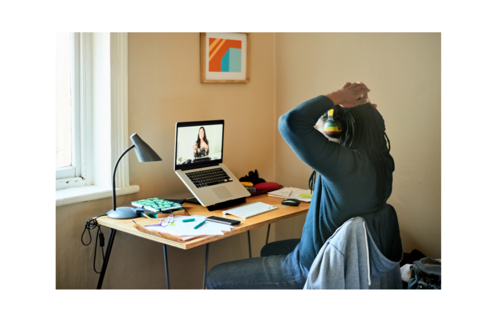 Remote workers, WARN ACT. View of man with dreadlocks working from home during a video conference.