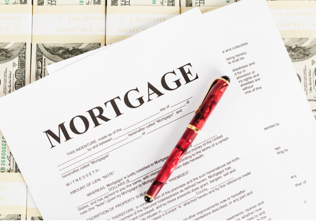Reverse Mortgage WARN case. View of a mortgage document on top of stacks of $100 bills. On top of all of all is an expensive looking red, black, and gold pen.