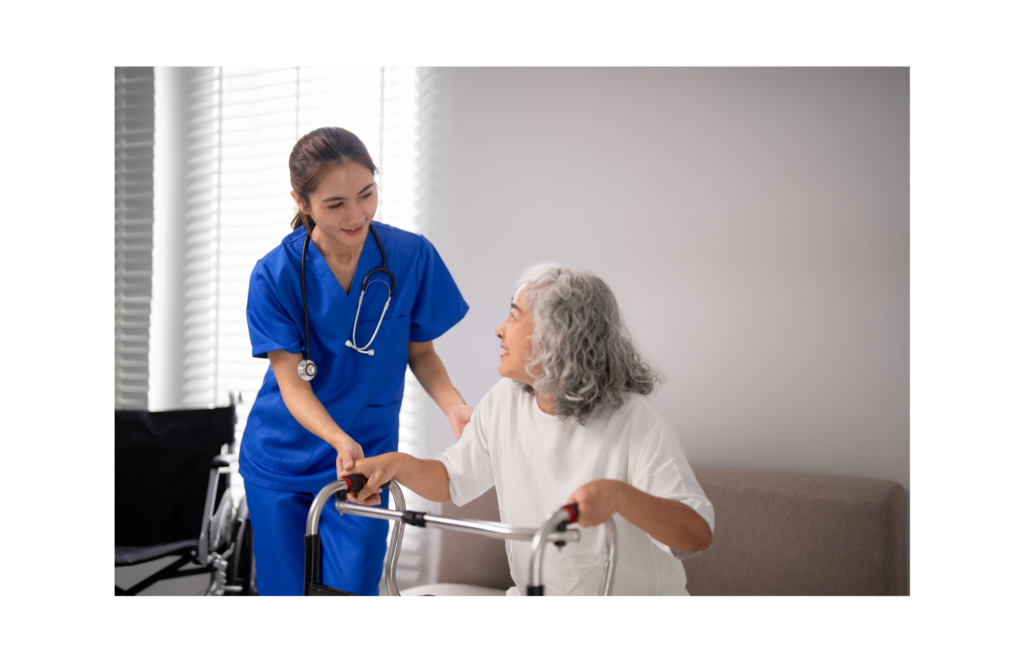 Univita Health WARN case. View of a woman home health aid in blue scrubs helping an older patient using a walker in white room.