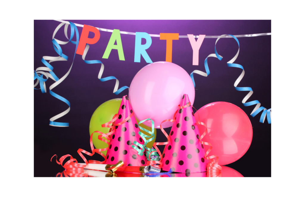 Party City WARN class action. View of a purple wall with a letters strung from the walls reading P-A-R-T-Y. Ballons, horns, and party hats in the foreground.
